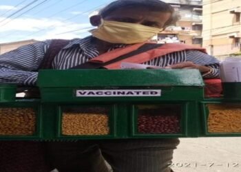 Shillong street vendor  earns  praise on social media for putting ‘vaccinated ‘ tag