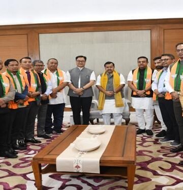 Eight UDP MLAs join BJP
